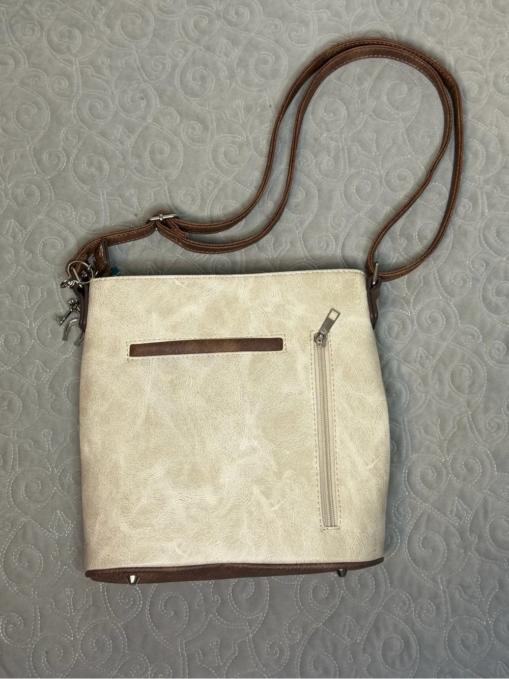 Women's Cream and Tan Crossbody Bag with Turquoise Accent